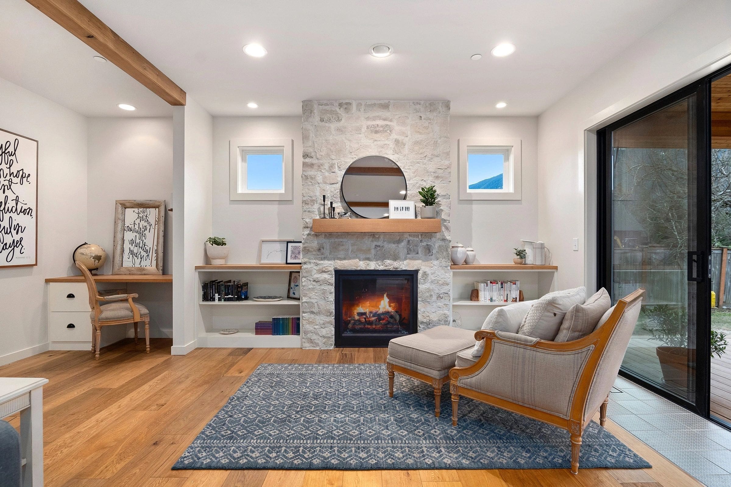 A living room with a fireplace and a couch