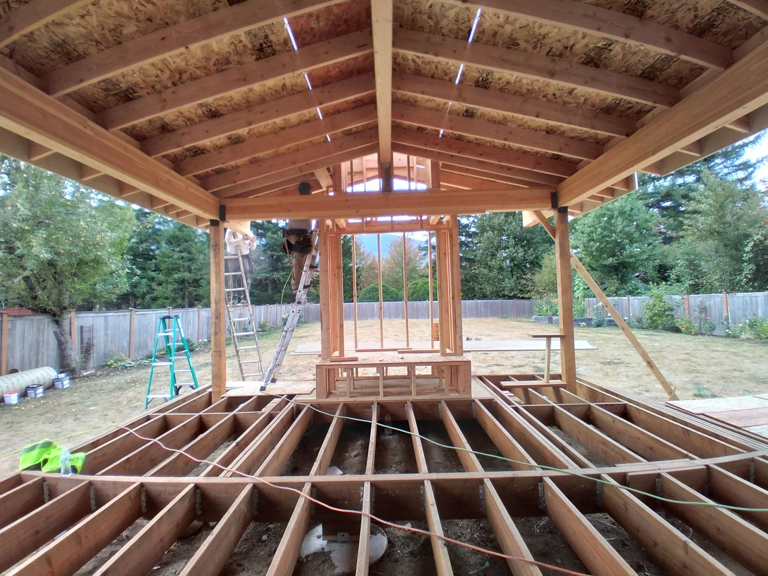 A wooden structure that is being built.