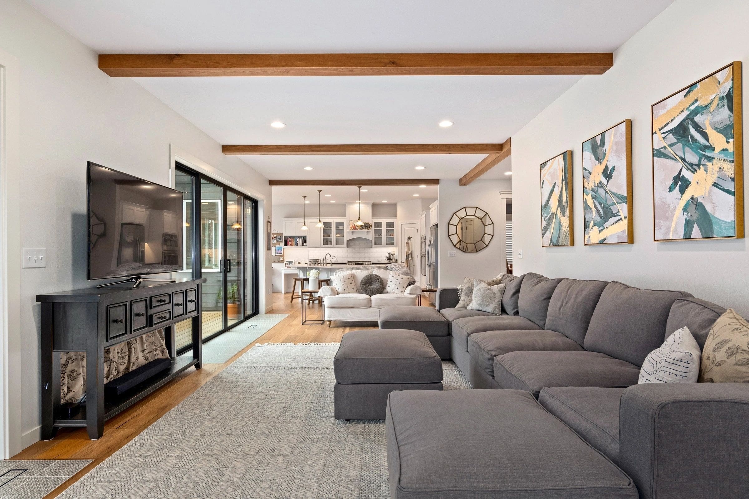 A living room with couches and a television.